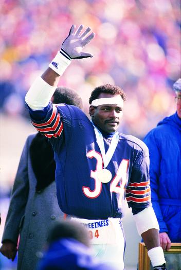 Walter Payton waving to crowd. 