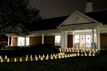 Front of the library with lanterns on the path and stairs