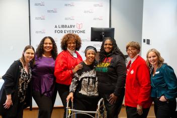 Group photo at Julian Legacy Museum reception, featuring Faith Julian in center. Photo by Tina Harle.