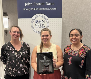 Photo (L-R): Anneliese Hohmeier, Natalie Kiburg, and Laura Espinoza of the Gail Borden Public Library's Public Relations & Exhibit's Team accepted the JCD Award on June 28, 2025 at the American Library Association (ALA) Conference JCD Awards Ceremony in Philadelphia.