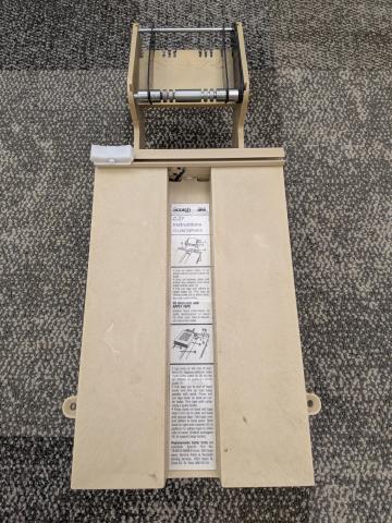 Tape dispenser for book spines.
